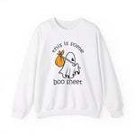 The unisex heavy blend crewneck sweatshirt, named This Is Some Boo Sheet - Funny Ghost Halloween, features a cute ghost with an orange sack and the phrase this is some boo sheet, perfect for spooky season attire.
