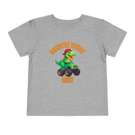 The Monster Truck Rex T-Shirt 🛻🦕 – Toddler Boys Tee is a gray Bella+Canvas shirt featuring a cartoon green dinosaur driving a monster truck and bold orange MONSTER TRUCK REX text—perfect for your little one!.