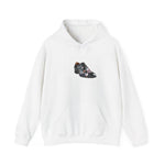 The Unisex Heavy Blend™ Hooded Sweatshirt is made from a cotton-polyester blend and features a graphic of a black dress shoe with an orange heel, subtly printed with DONT FORGET MY SHOE. Made ethically from US-grown cotton, this hoodie includes a front pocket and drawstrings.