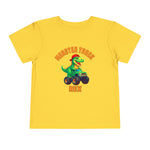 The Monster Truck Rex T-Shirt 🛻🦕 – Toddler Boys Tee is a yellow Bella+Canvas shirt with a green cartoon T-Rex driving a monster truck and MONSTER TRUCK REX in bold orange letters—perfect for any toddler dinosaur shirt collection.