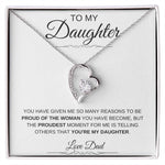 The To My Daughter: Forever Connected Message Card & Love Knot Necklace Set features a silver necklace with a white gold finish and cubic zirconia, displayed in a box that reads: To my Daughter. Proud of you. Proudest to call you my daughter. Love, Dad.