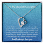 The Forever Love Necklace - Heartfelt Gift for Your Daughter features a silver heart-shaped pendant with cubic zirconia, packaged in a box with Forever Love Necklace in white text on a blue gradient background, finished with 14k white gold to express pride and everlasting love.