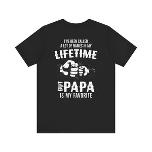 The Unisex Jersey Short Sleeve Tee PAPA Print Mens Tee is a comfy polyester crew neck top with Ive been called a lot of names in my lifetime but Papa is my favorite and a two-fist bump graphic—perfect casual gift for dads.
