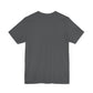 A minimalist “There Is No Spoon” tee in plain dark gray, shown from the back with short sleeves and no visible designs, logos, or text.