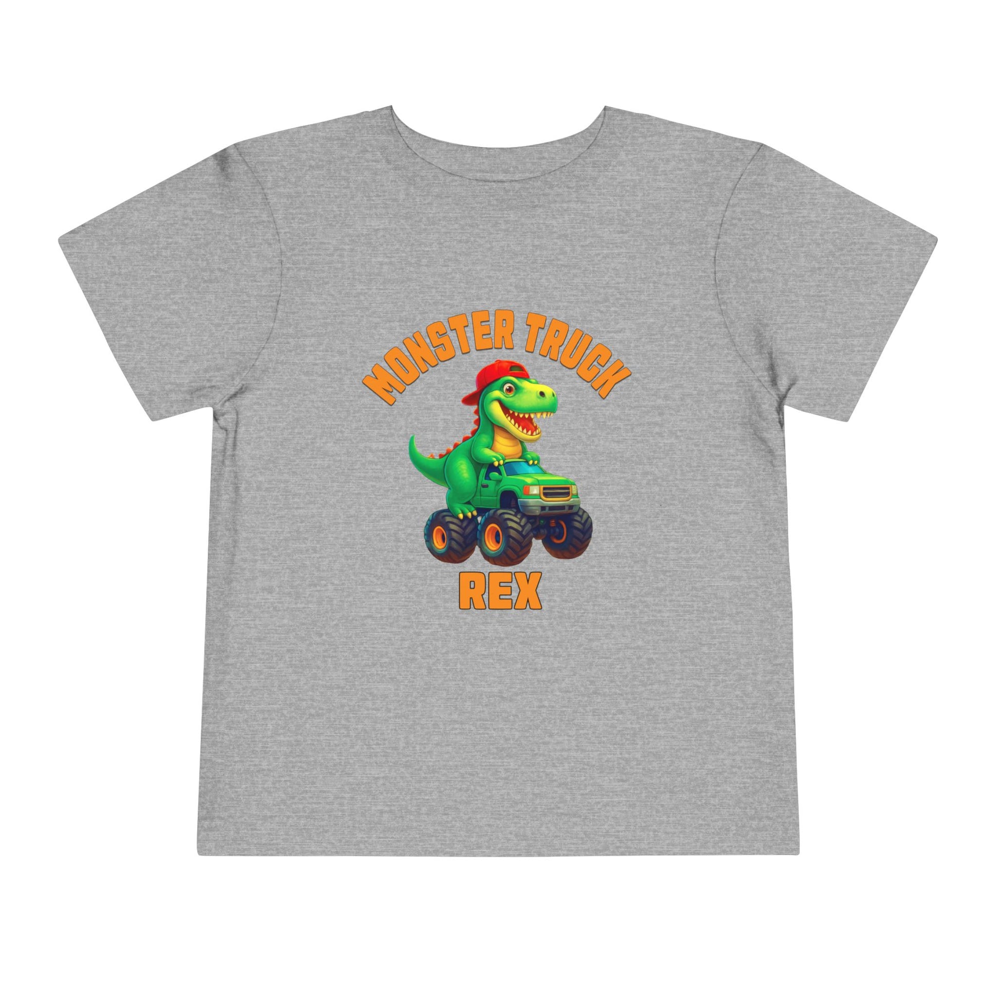 The Monster Truck Rex T-Shirt 🛻🦕 – Toddler Boys Tee is a gray Bella+Canvas shirt featuring a cartoon green dinosaur driving a monster truck and bold orange MONSTER TRUCK REX text—perfect for your little one!.