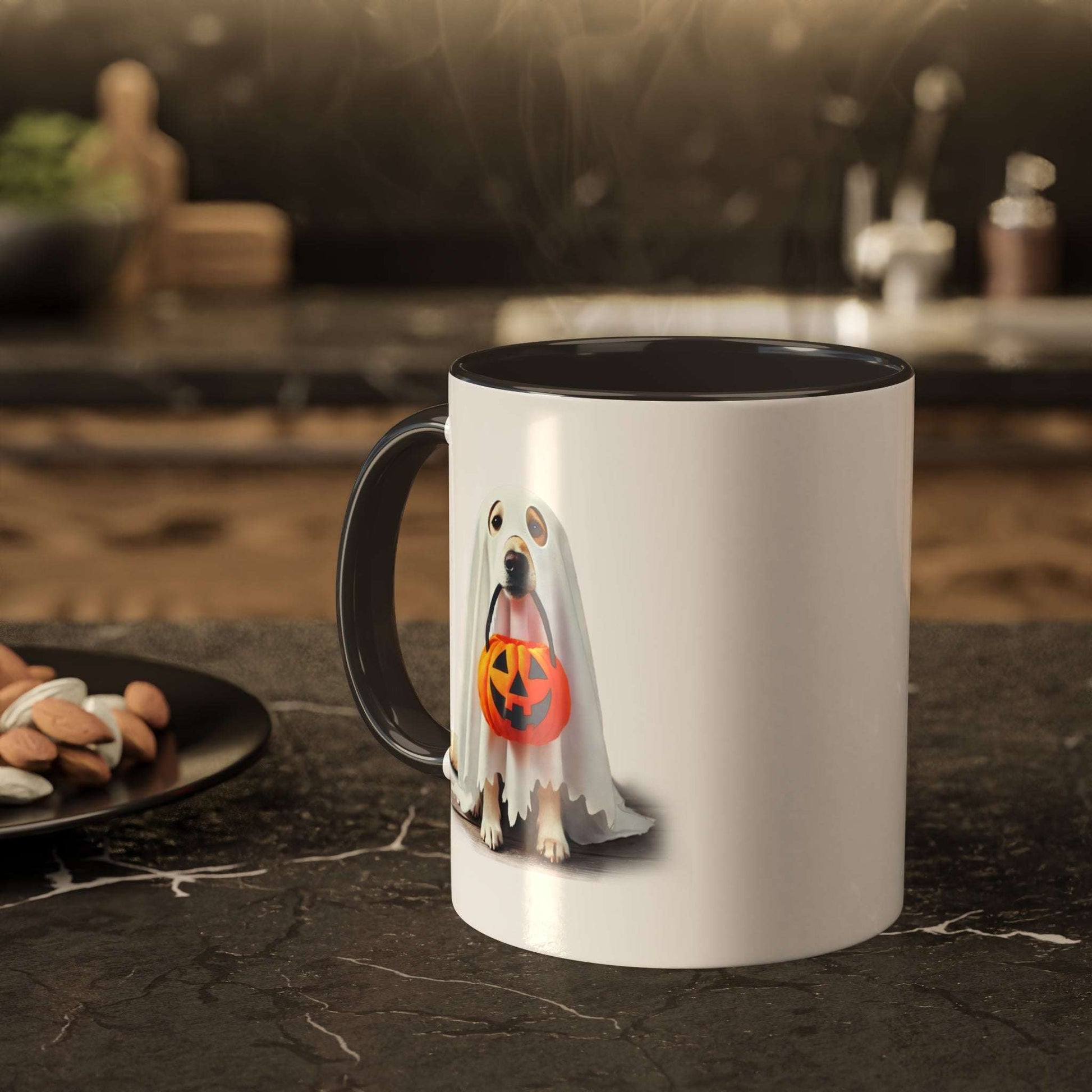 The Ghostly Pup Halloween Mug – Spooktacular Coffee Companion features a cute dog in a ghost costume with a pumpkin basket. Set on a kitchen counter next to nuts on a plate, its charming design stands out against the softly blurred background.