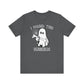 The I Found This Humerus - Funny Halloween Ghost T-Shirt is a dark gray tee with a playful ghost holding a bone and spider web, plus white lettering saying I FOUND THIS HUMERUS for extra spooky fun.