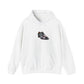 The Unisex Heavy Blend™ Hooded Sweatshirt is made from a cotton-polyester blend and features a graphic of a black dress shoe with an orange heel, subtly printed with DONT FORGET MY SHOE. Made ethically from US-grown cotton, this hoodie includes a front pocket and drawstrings.