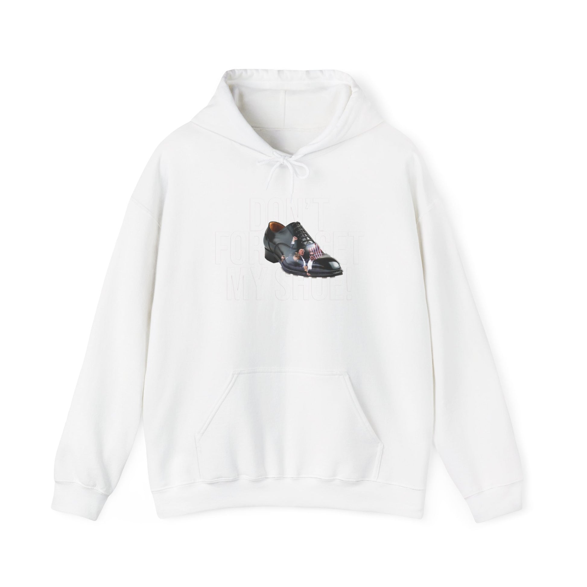 The Unisex Heavy Blend™ Hooded Sweatshirt is made from a cotton-polyester blend and features a graphic of a black dress shoe with an orange heel, subtly printed with DONT FORGET MY SHOE. Made ethically from US-grown cotton, this hoodie includes a front pocket and drawstrings.
