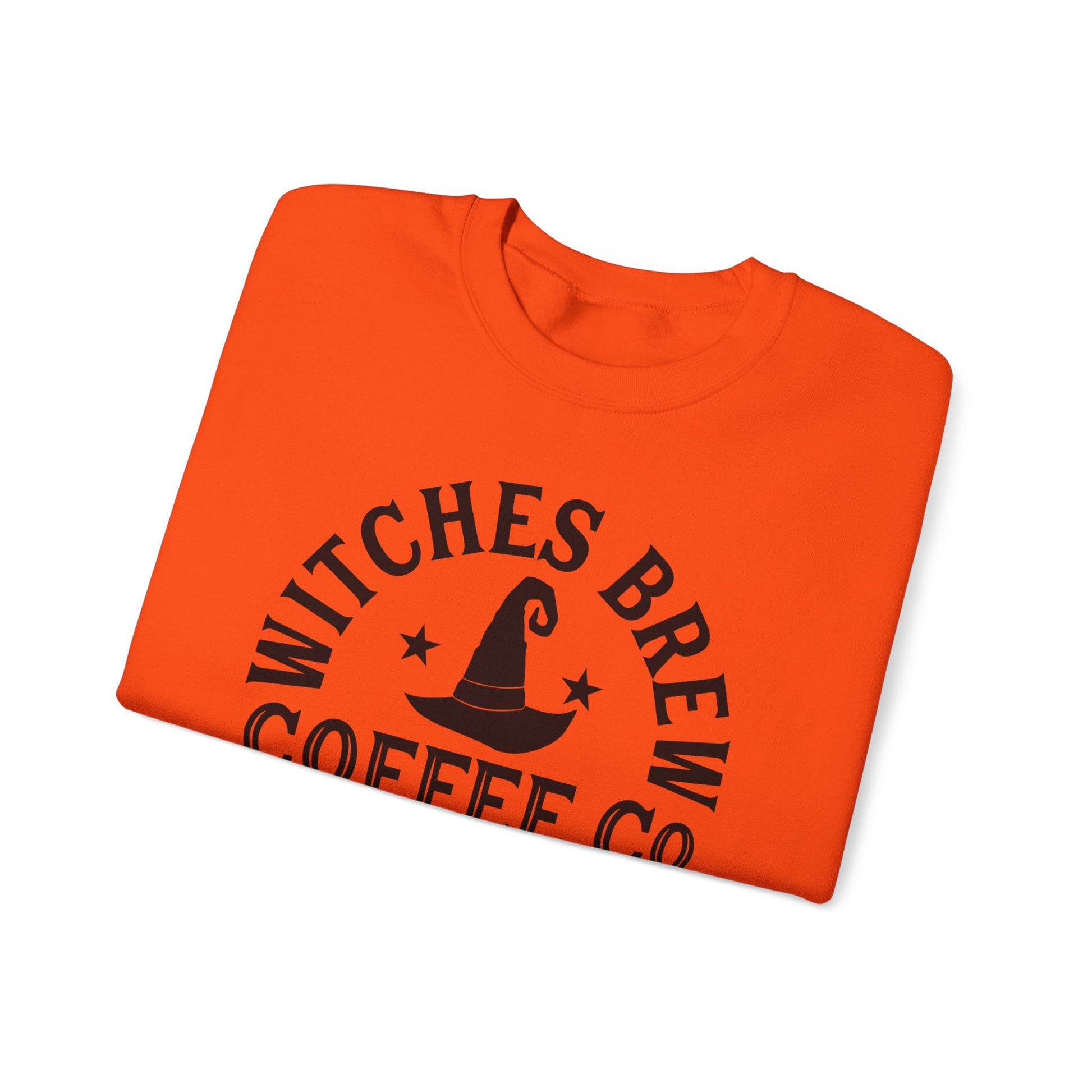 The Witches Brew Coffee Co. Sweatshirt, a unisex heavy blend crewneck in vibrant orange with black Witches Brew Coffee Co text and a whimsical star-adorned witchs hat, is perfect for adding Halloween flair to your wardrobe.