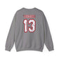 Perfect for horror enthusiasts, the Voorhees 13 unisex heavy blend sweatshirt features a bold red and white VOORHEES 13 on the back, with number 13 in a distressed finish—ideal for those channeling their inner Jason Voorhees.