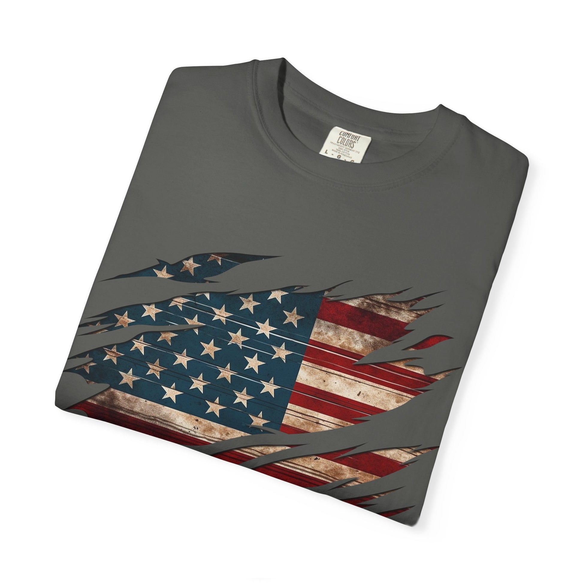 The “Torn Patriot” Distressed American Flag Comfort Colors Tee features a bold, claw-mark-style flag design on a soft gray shirt, creating a standout patriotic look with statement-worthy style.