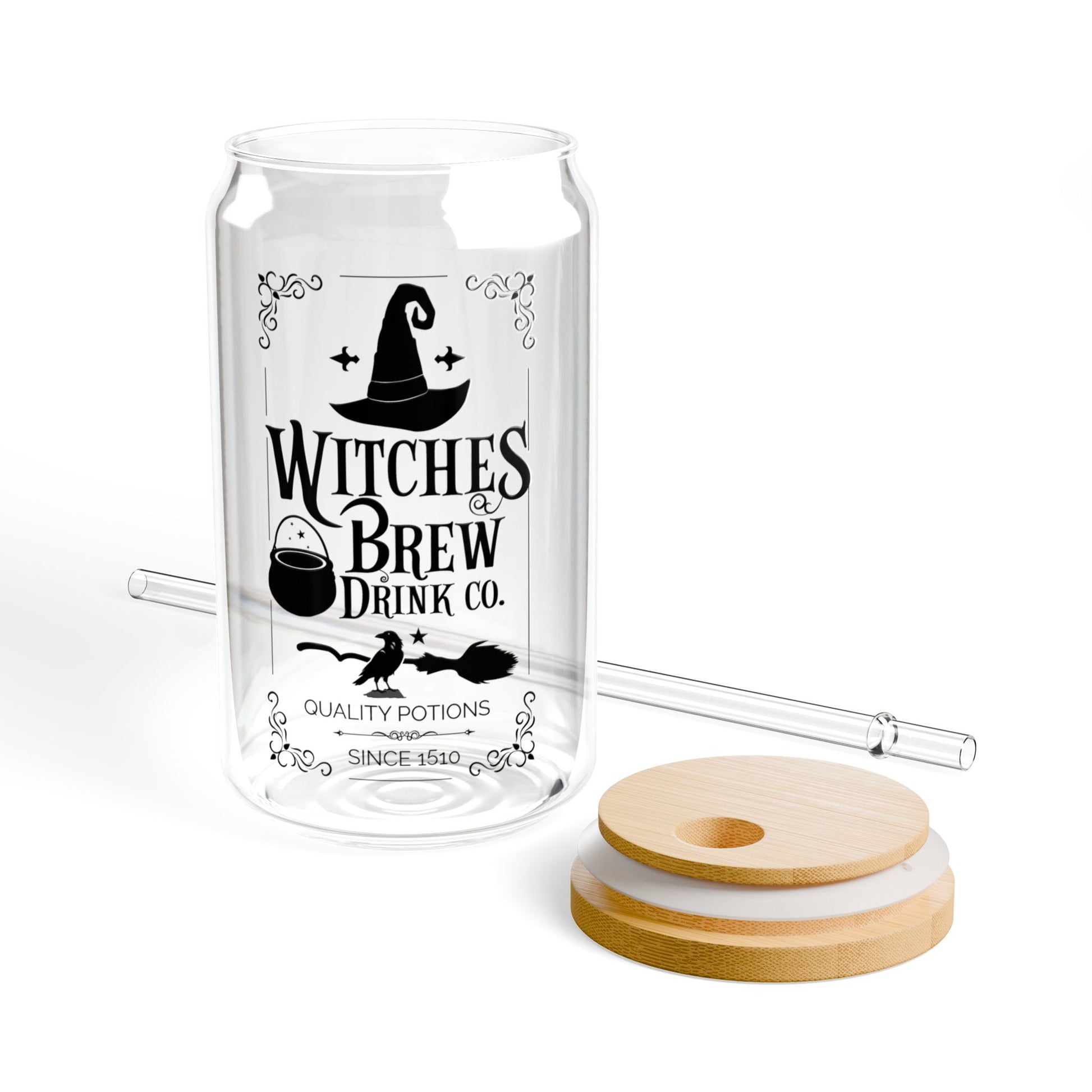 The Witches Brew Drink Co. 16oz Halloween Sipper Glass features a witch hat design, bamboo lid, and glass straw, all set against a white background.