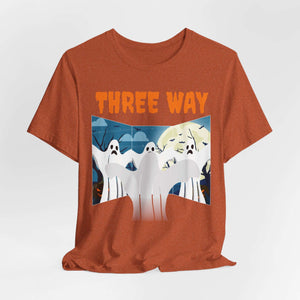The Three-Way Mirror Ghost Tee is an orange unisex jersey featuring three cartoon ghosts with THREE WAY above them on a spooky background, inspired by the viral TikTok trend. Perfect for any spirited occasion!.