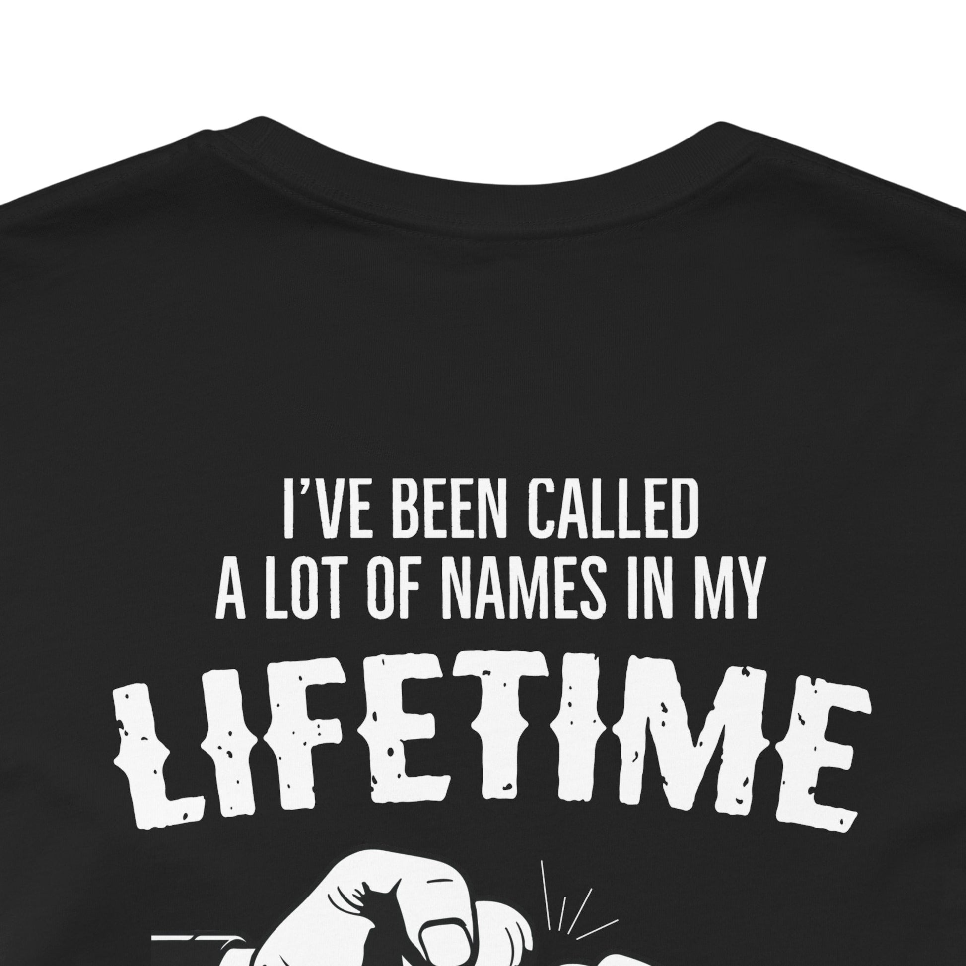 Close-up of a black unisex jersey tee with white text that reads: Papa Is My Favorite. An illustrated hand is partially visible at the bottom of the image.