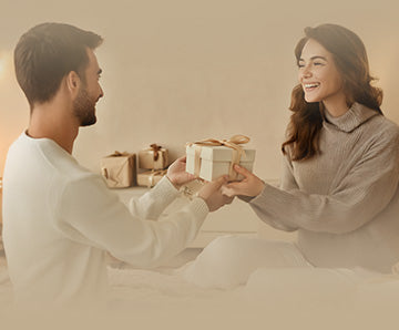 A woman receiving and smiling at the gift-Mobile-3.jpg__PID:d6264fde-986b-4972-bf5a-25e69499b1b8
