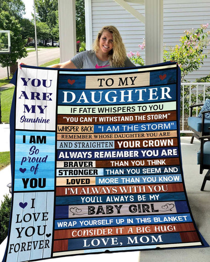 Rustic-style patchwork blanket with an inspirational message from a mother to her daughter, featuring wooden plank textures and motivational quotes.