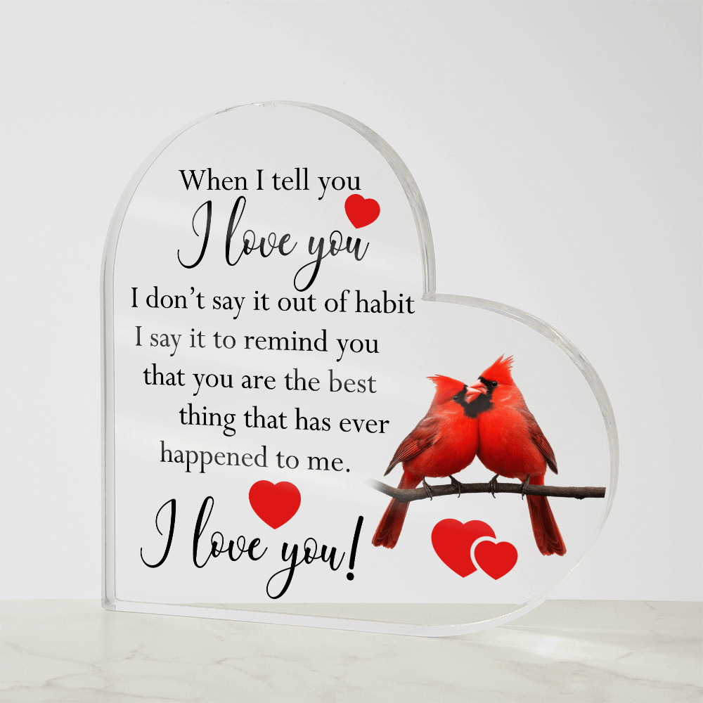 Heart-shaped acrylic plaque featuring a romantic message with two red cardinals perched on a branch, symbolizing love and devotion.