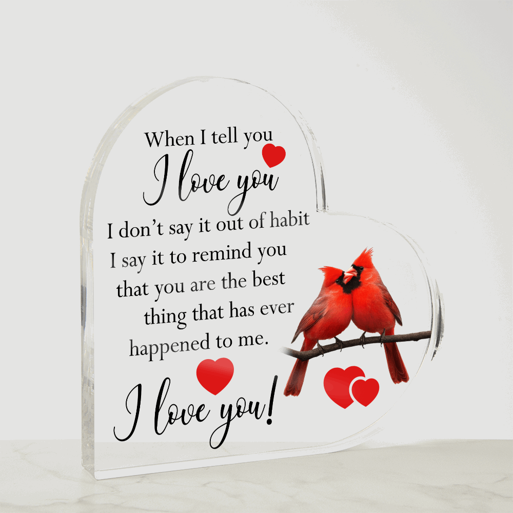 Heart-shaped acrylic plaque featuring a romantic message with two red cardinals perched on a branch, symbolizing love and devotion.