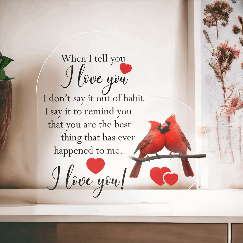 Heart-shaped acrylic plaque featuring a romantic message with two red cardinals perched on a branch, symbolizing love and devotion.