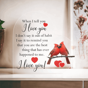 Heart-shaped acrylic plaque featuring a romantic message with two red cardinals perched on a branch, symbolizing love and devotion.