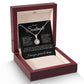 The To My Soulmate - Eternal Hope Pendant features a circular cubic zirconia pendant, presented in an elegant dark wooden box with a cream interior, and includes a heartfelt message card for your soulmate.
