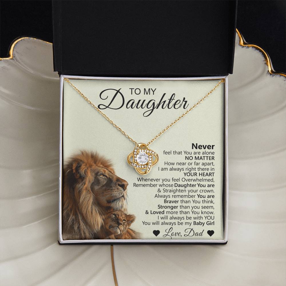 The To My Daughter – Love Knot Necklace features a heart-shaped pendant and comes in a box with a card showing a lion and cub plus an encouraging message from dad, making it the perfect gift for daughters.