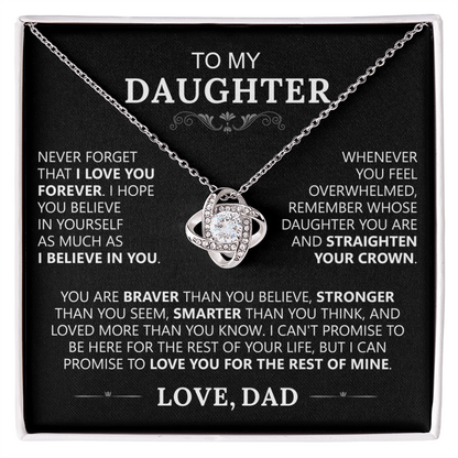 The To My Daughter - Love Knot Necklace comes in a gift box with a touching message from father to daughter, expressing love, encouragement, and support—celebrating their unbreakable bond in white text on a black background.