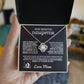 Silver love knot necklace with a sparkling crystal, presented in a gift box with a heartfelt message from a mother to her daughter