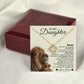 The To My Daughter – Love Knot Necklace comes with a lion & cub message card featuring a heartfelt fathers note and lion image, all elegantly displayed before a polished dark red jewelry box.