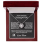 Silver love knot necklace with a sparkling crystal, presented in a gift box with a heartfelt message from a mother to her daughter