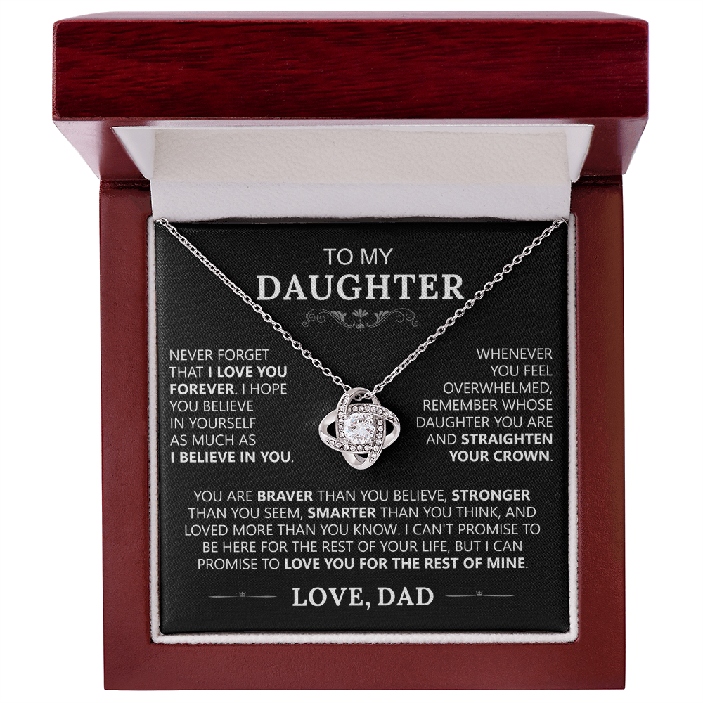 The To My Daughter - Love Knot Necklace features a heart pendant in a wooden box with a heartfelt message from dad, making it the perfect father-daughter gift to express love, support, and encouragement.