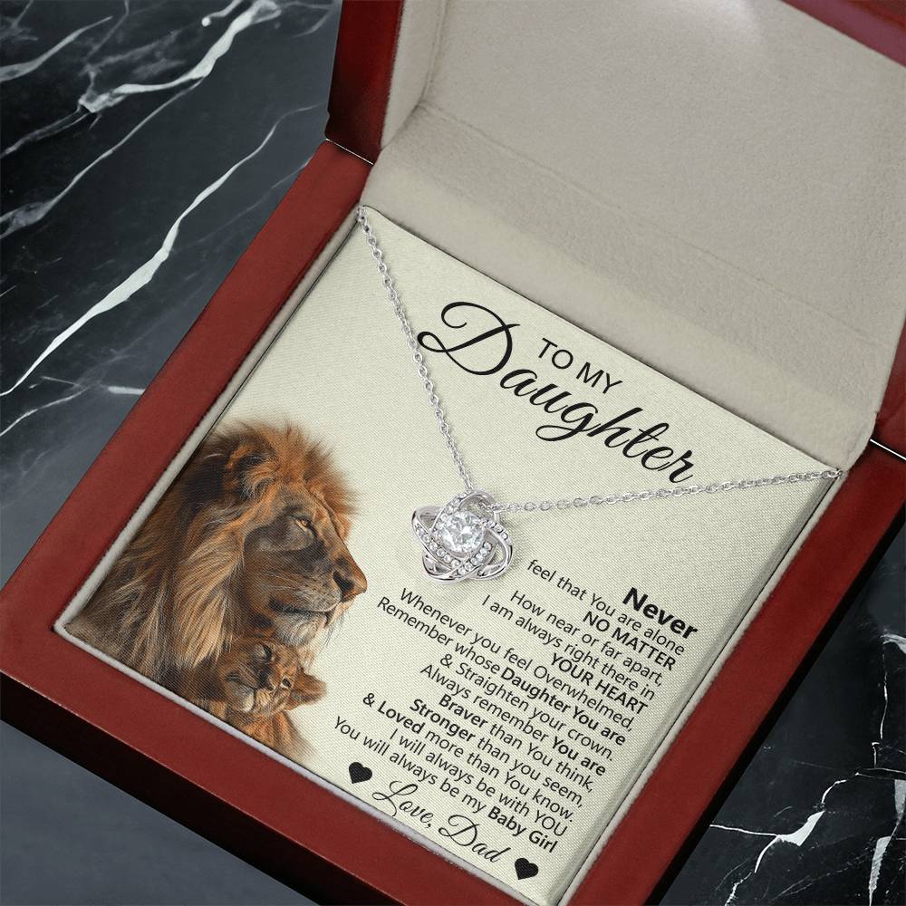 The To My Daughter – Love Knot Necklace with Lion & Cub Message Card features a silver necklace in a red box, displayed on a card with lions and heartfelt words from Dad—an ideal gift to show love, strength, and encouragement.