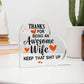 Heart-shaped acrylic plaque with a bold, humorous message thanking an awesome wife, accented with orange hearts.