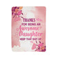 Pink floral-themed blanket with a bold, humorous message thanking an awesome daughter