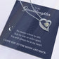 The To My Granddaughter - Forever Love Necklace with Heartfelt Message Card features a heart-shaped necklace with a diamond, paired with a card expressing love, connection across distances, and ending lovingly with I LOVE YOU TO THE MOON AND BACK.